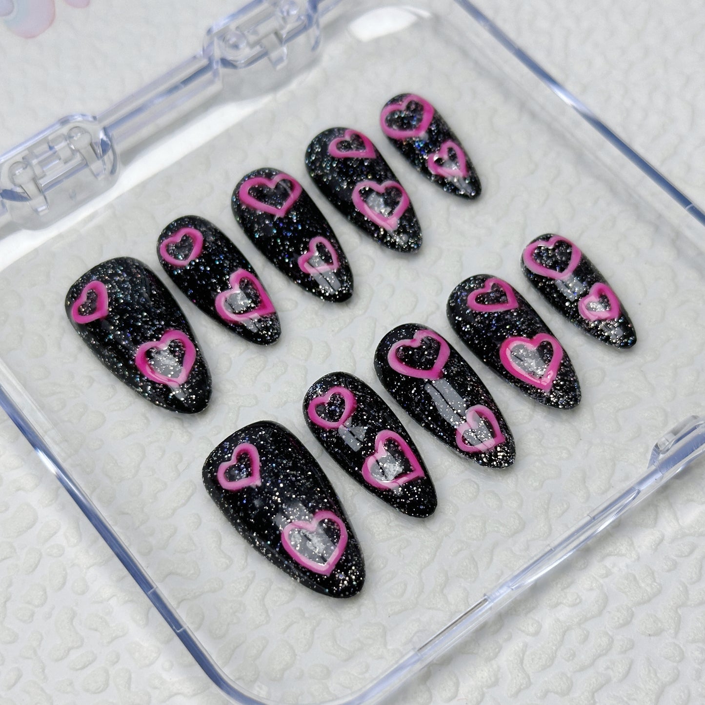* Black Pink Heart Spark | Handmade Press-On Nails | Style No. A042 | Glow-in-the-Dark Pink Hearts on Glitter Black