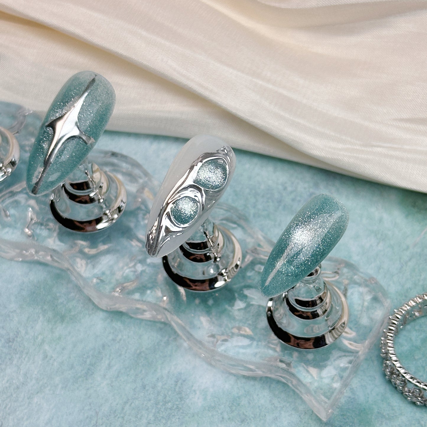 Glacier Edge | Handmade Press-On Nails | Style No. A035 | Teal Chrome Texture, Molten Silver Accents, Reusable Futuristic Nail Set