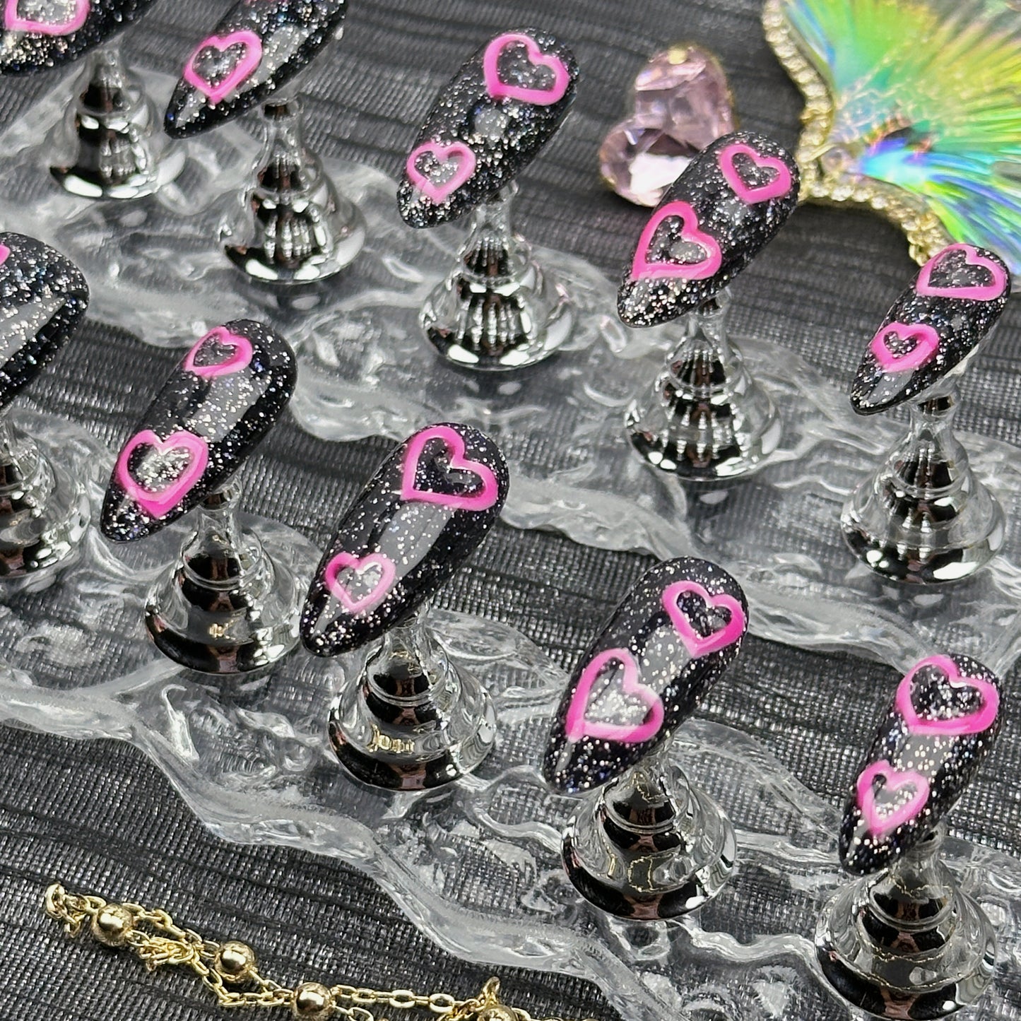 * Black Pink Heart Spark | Handmade Press-On Nails | Style No. A042 | Glow-in-the-Dark Pink Hearts on Glitter Black