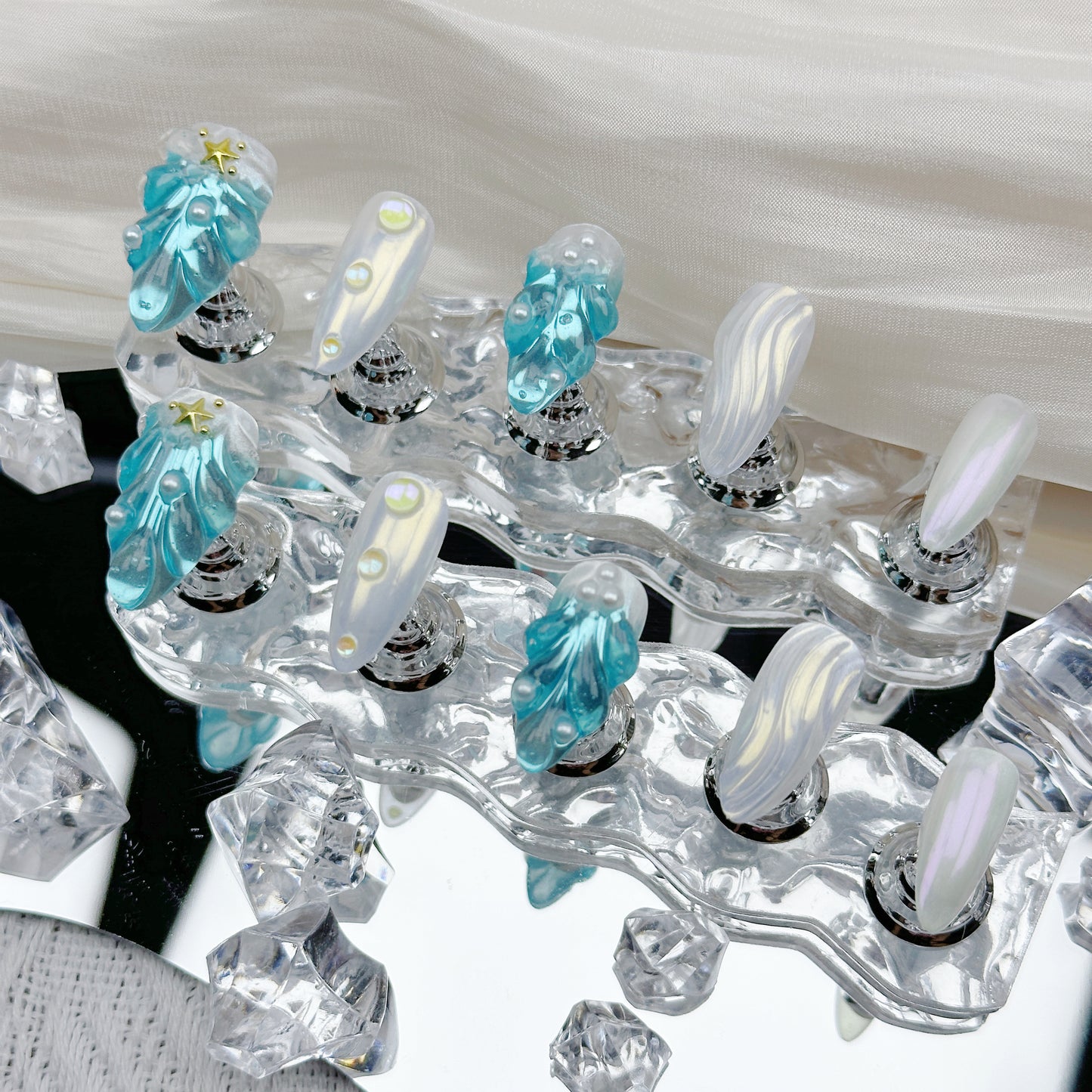 Frozen Pearl | Handmade Press-On Nails | Style No. A028 | 3D Blue Sculpted Charms, Iridescent White Shell Finish, Reusable Nail Set