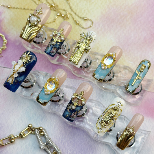 Divine Icons | Handmade Press-On Nails | Style No. A039| Gold Religious Charms, Marble Blue Base & Cross Embellishments, Reusable Statement Nail Set