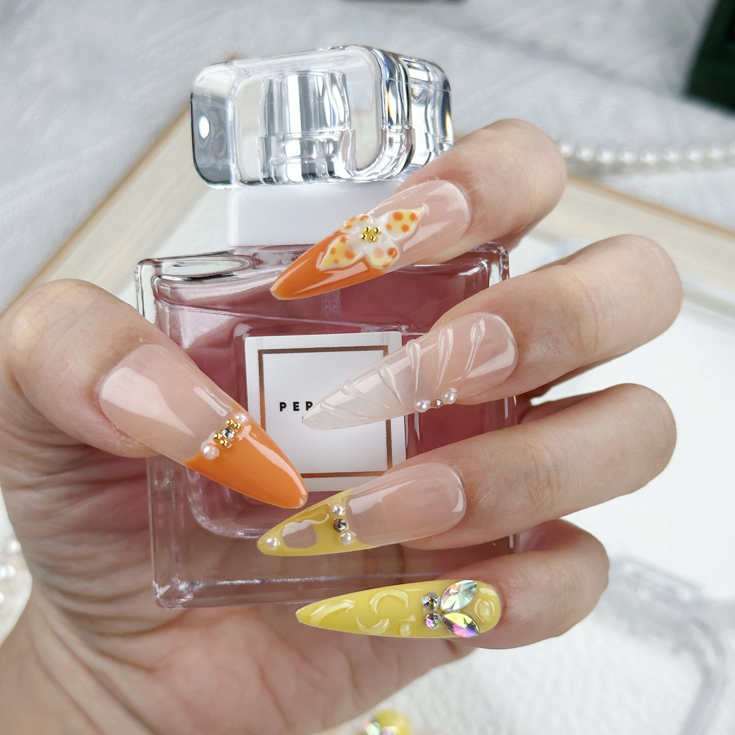 Citrus Bloom | Handmade Press-On Nails | Style No. A023 | Orange & Yellow Tips, Butterfly & Floral Accents, Reusable Nail Set
