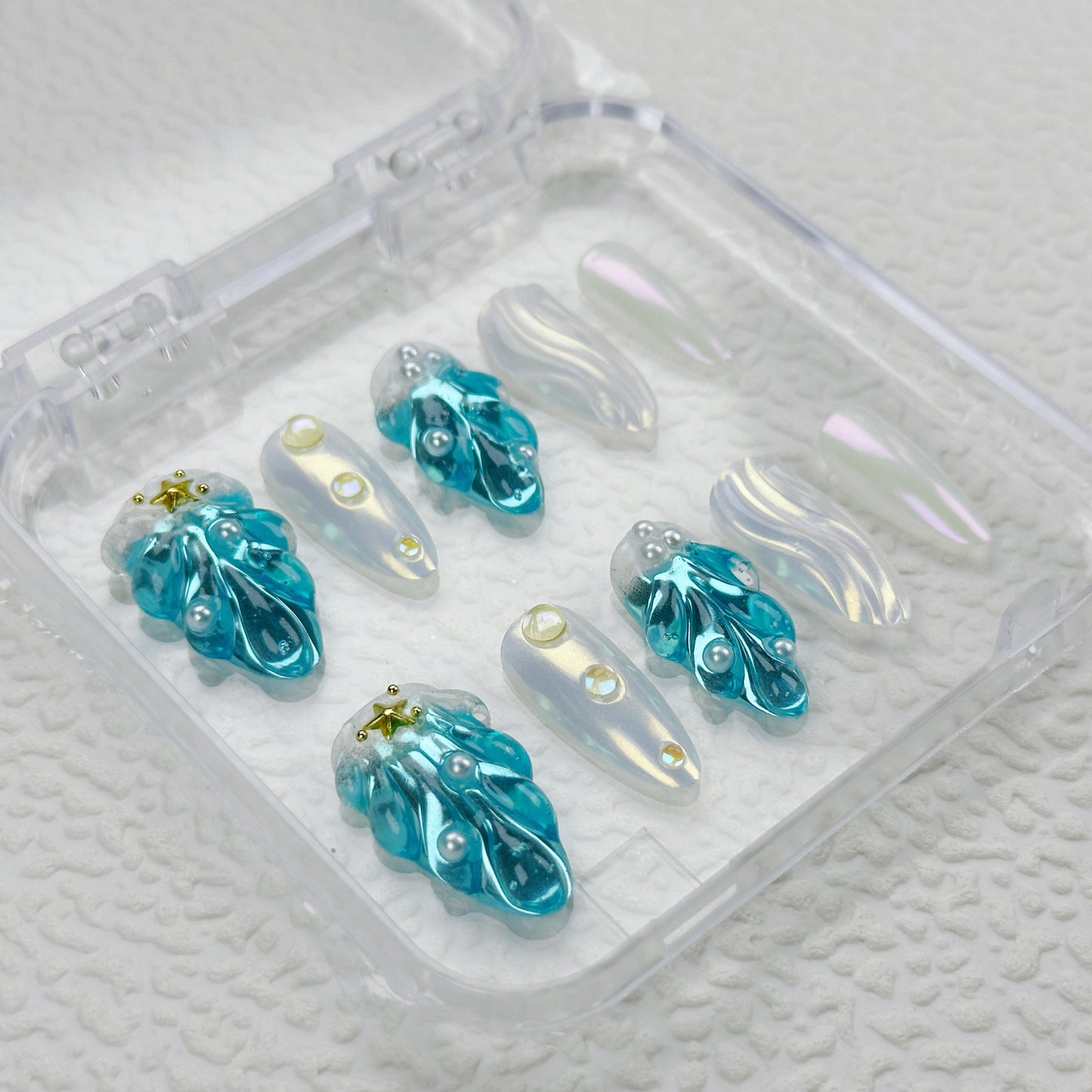 Frozen Pearl | Handmade Press-On Nails | Style No. A028 | 3D Blue Sculpted Charms, Iridescent White Shell Finish, Reusable Nail Set