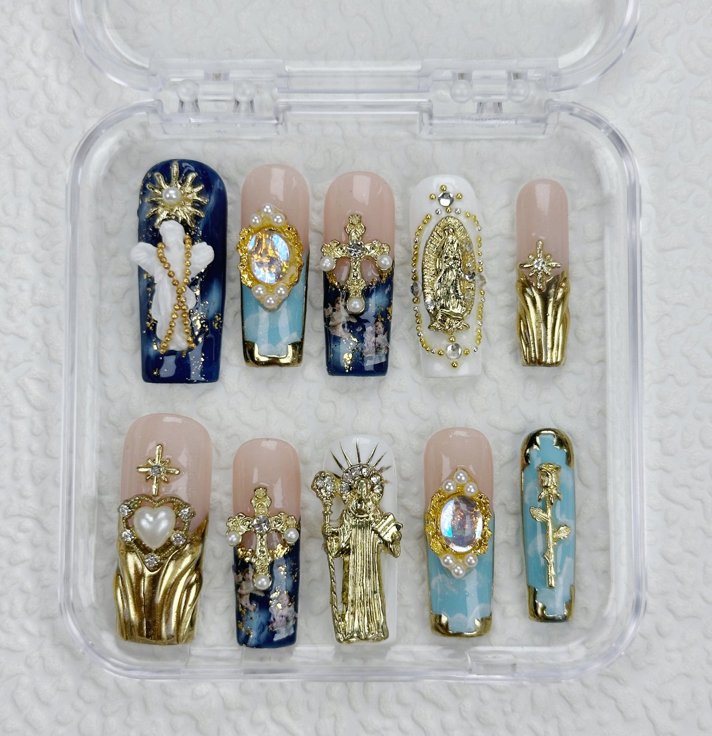 Divine Icons | Handmade Press-On Nails | Style No. A039| Gold Religious Charms, Marble Blue Base & Cross Embellishments, Reusable Statement Nail Set