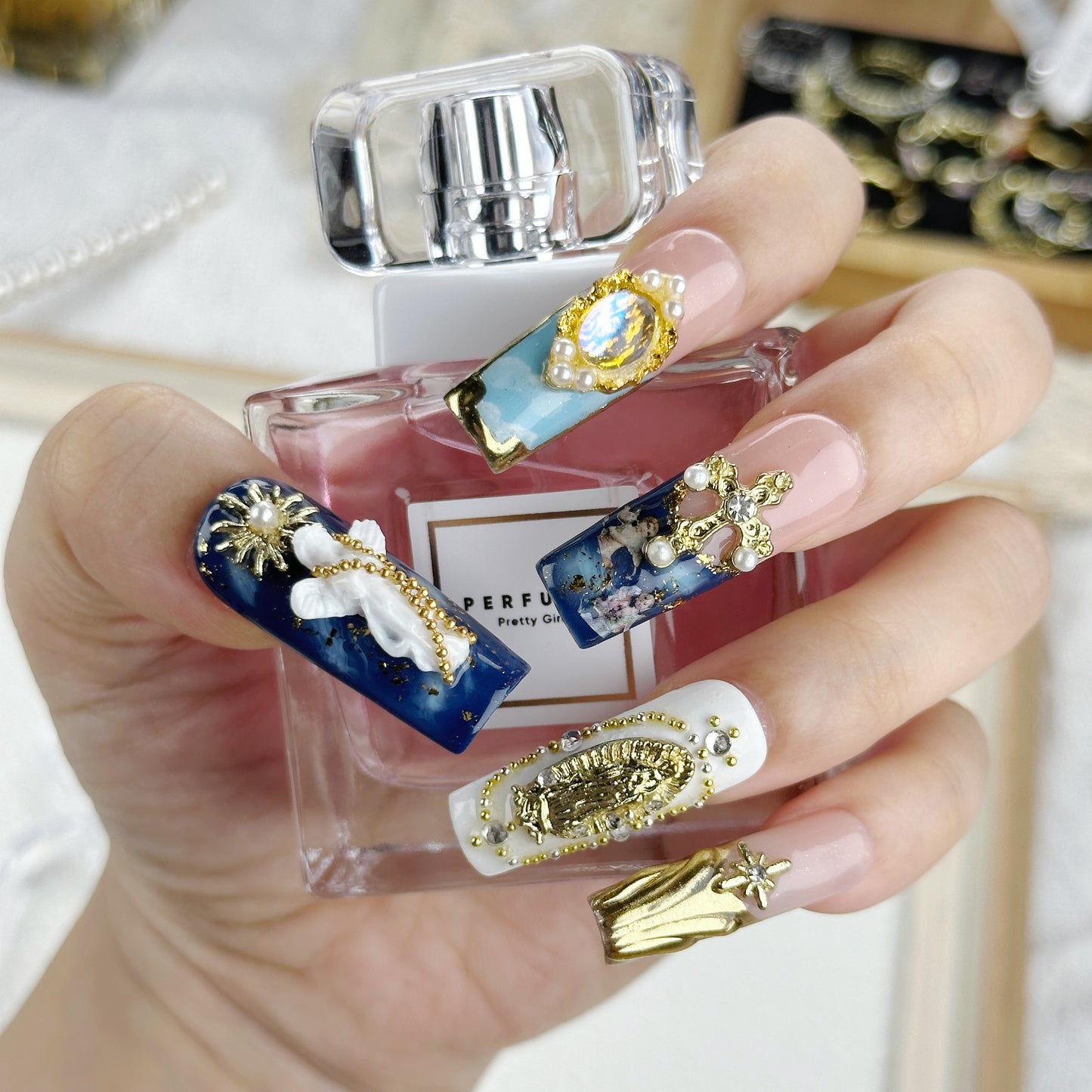 Divine Icons | Handmade Press-On Nails | Style No. A039| Gold Religious Charms, Marble Blue Base & Cross Embellishments, Reusable Statement Nail Set